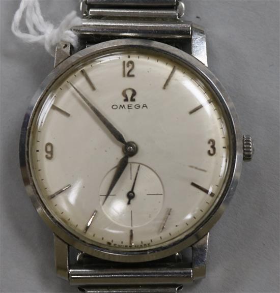 A gentlemans 1940s? stainless steel Omega manual wind wrist watch.